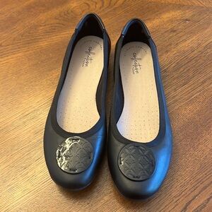 Black Clarks flats with toe detail